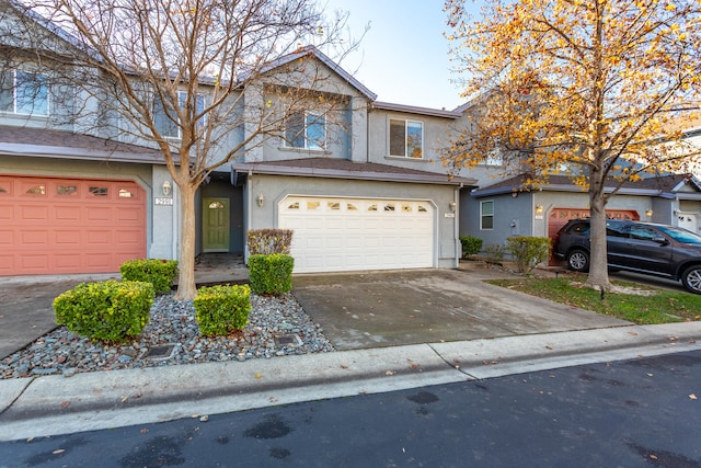 front of property with a garage