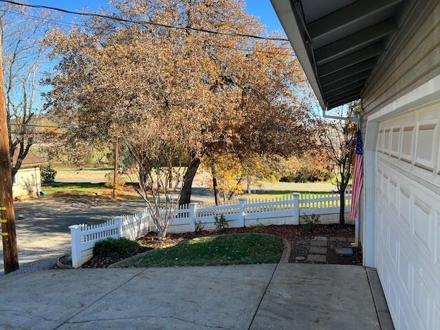 view of patio / terrace with a garage