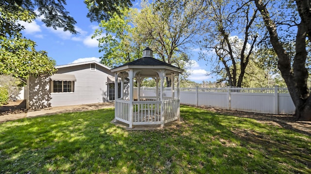 view of yard featuring a gazebo and fence