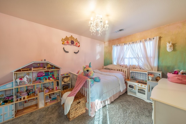 carpeted bedroom with an inviting chandelier