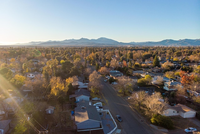 drone / aerial view featuring a mountain view