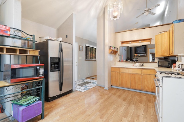 kitchen featuring ceiling fan, high vaulted ceiling, stainless steel refrigerator with ice dispenser, white range oven, and light hardwood / wood-style floors