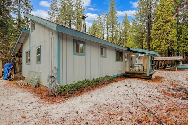 view of side of home featuring a deck