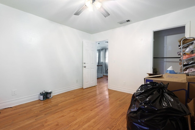 interior space with ceiling fan and light hardwood / wood-style floors