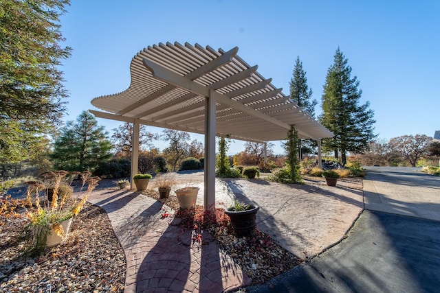 exterior space featuring a pergola