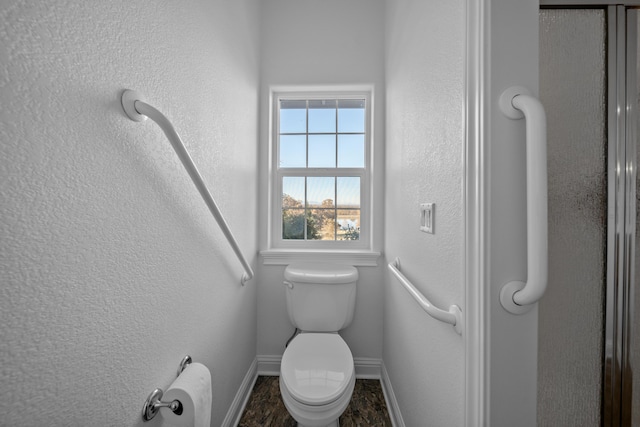 bathroom featuring toilet