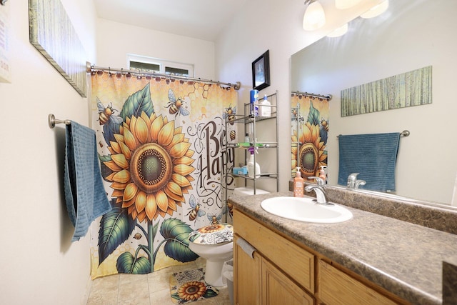 bathroom with a shower with curtain, tile patterned flooring, vanity, and toilet