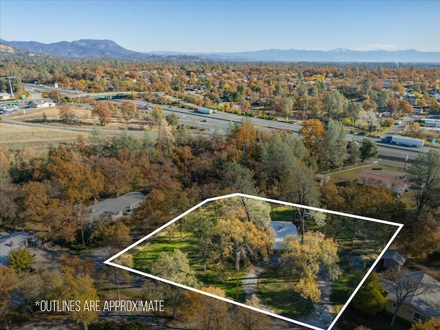 bird's eye view with a mountain view