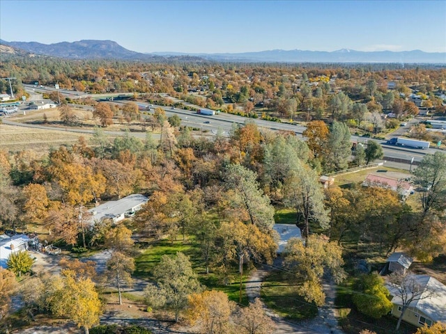 birds eye view of property featuring a mountain view