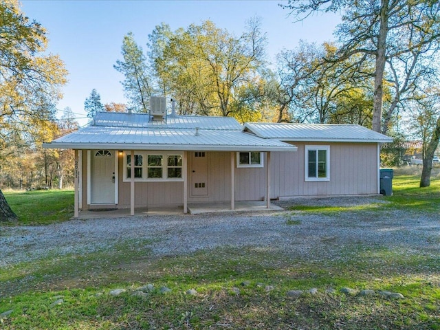 back of property featuring central air condition unit