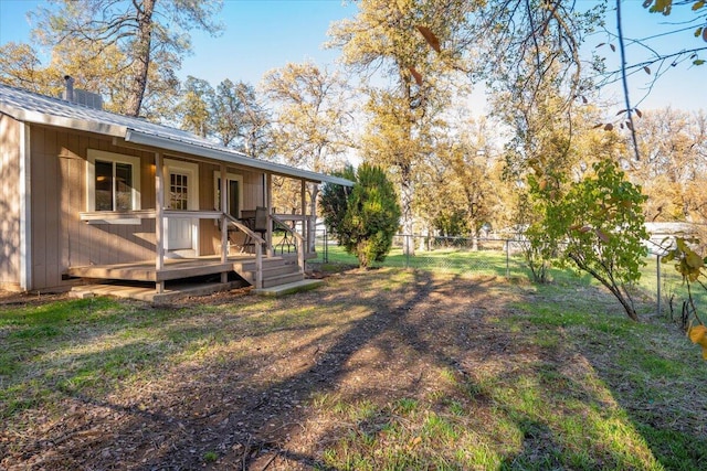 view of yard featuring a deck