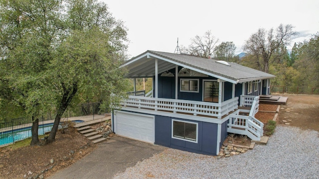 8781 Simmons Rd, Redding, CA 96001 - view of front of property with asphalt driveway and an attached garage