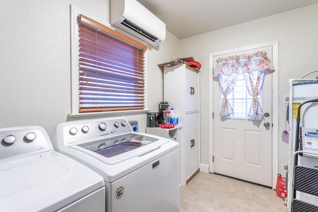 laundry area featuring an AC wall unit, washing machine and clothes dryer, light tile patterned floors, and water heater