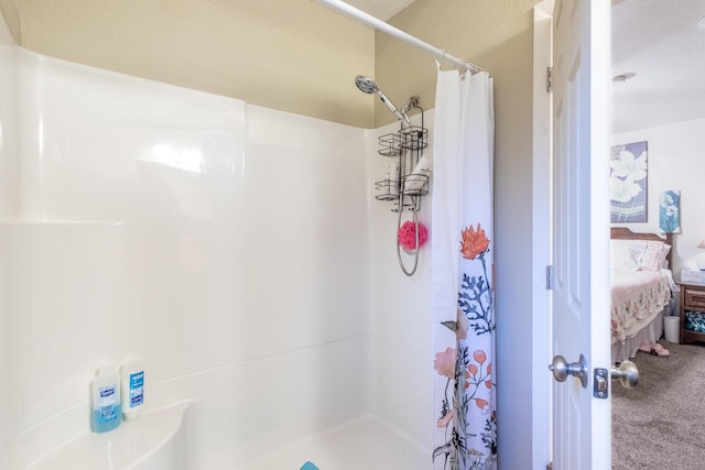 bathroom featuring walk in shower