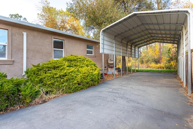 view of car parking with a carport