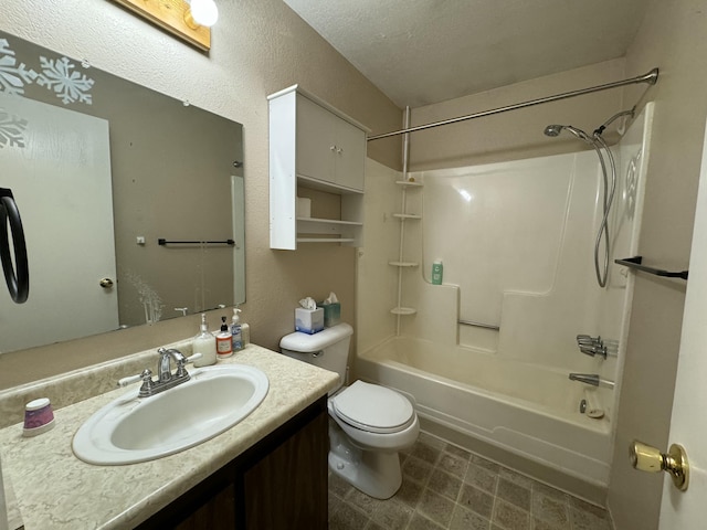 full bathroom with a textured ceiling, vanity, bathtub / shower combination, and toilet