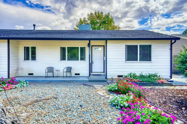 single story home featuring covered porch