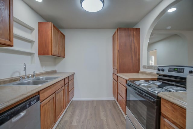 kitchen featuring light hardwood / wood-style floors, sink, and stainless steel appliances