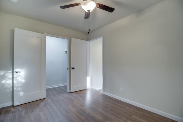 unfurnished bedroom with hardwood / wood-style floors and ceiling fan