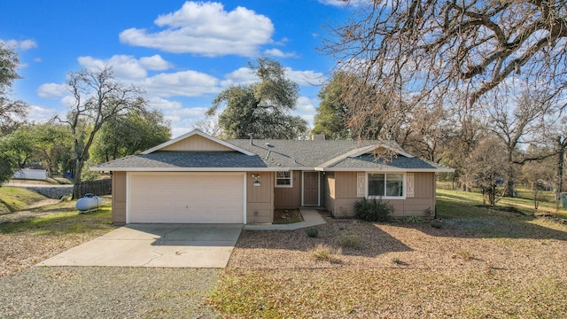 ranch-style house with a front yard and a garage