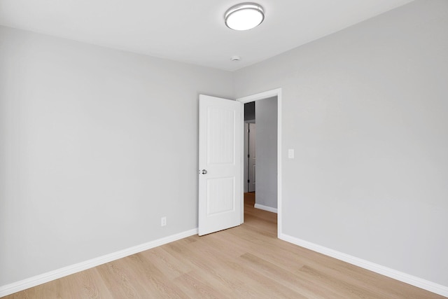 unfurnished room featuring light hardwood / wood-style floors