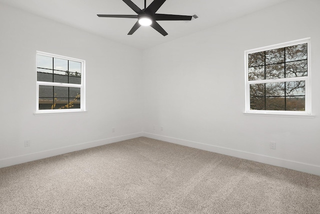 unfurnished room with carpet floors and ceiling fan