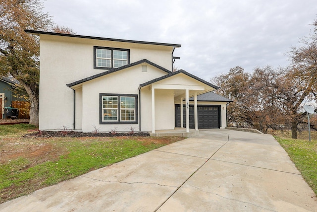 front of property featuring a garage