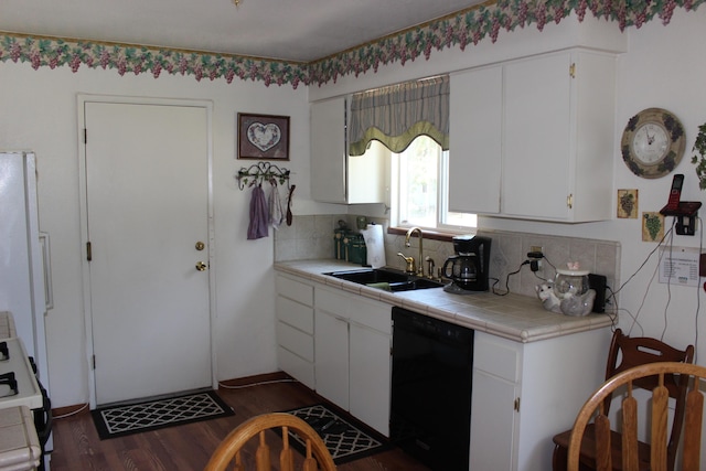 kitchen featuring white cabinets, decorative backsplash, white appliances, and sink