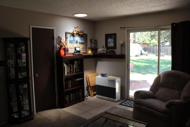 tiled living room with a textured ceiling