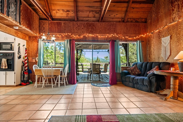 unfurnished living room featuring tile patterned floors, wood ceiling, and high vaulted ceiling