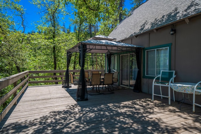 wooden terrace with a gazebo