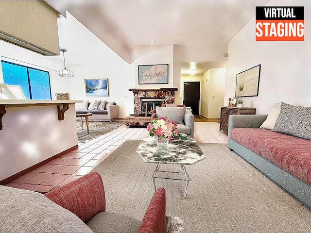 living room featuring light tile patterned flooring and a fireplace