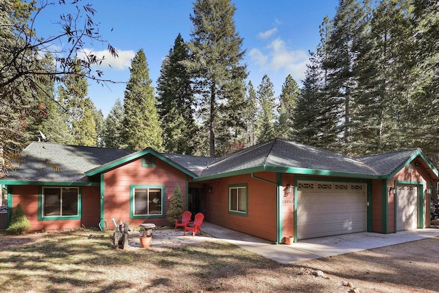 ranch-style home with a garage