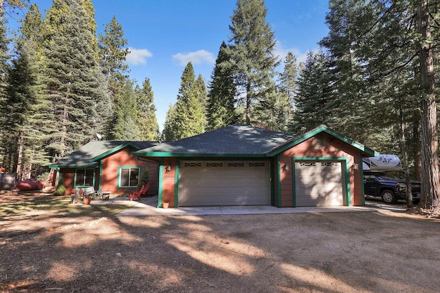 single story home with a garage