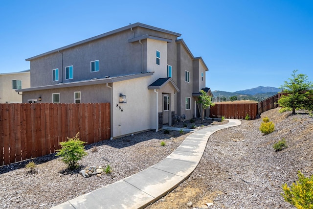 exterior space featuring a mountain view