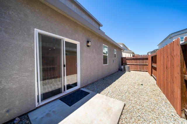 exterior space featuring a patio and central AC unit