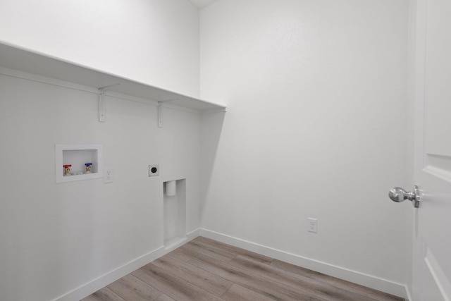 laundry room with washer hookup, light hardwood / wood-style floors, and hookup for an electric dryer