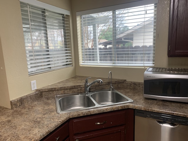 kitchen with dishwasher and sink