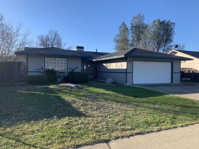 single story home with a garage and a front lawn