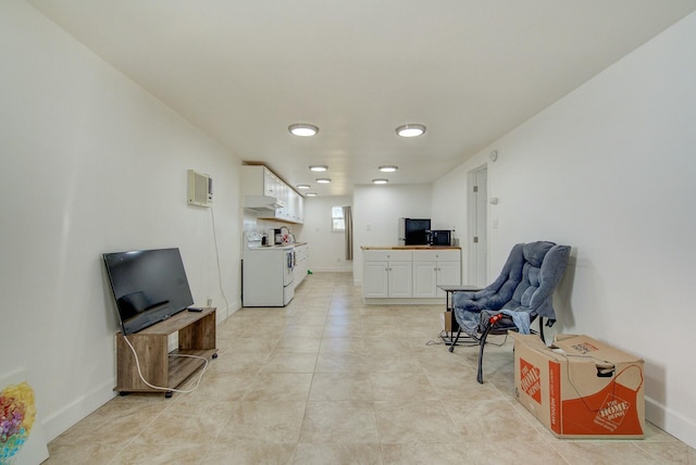 living area with light tile patterned flooring