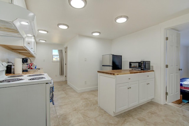 kitchen with stainless steel refrigerator, wooden counters, ventilation hood, white range with electric cooktop, and white cabinets