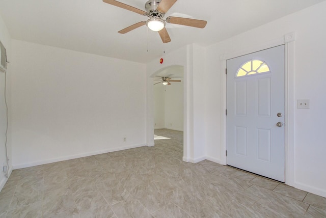 entryway featuring ceiling fan