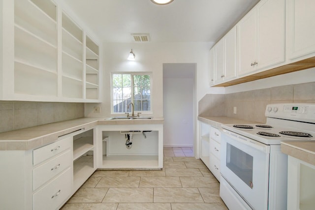 kitchen with backsplash, white electric range oven, sink, light tile patterned floors, and white cabinets