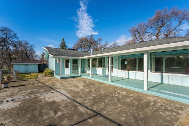 rear view of house with a patio