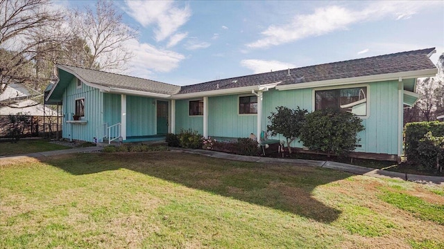 ranch-style house with a front yard