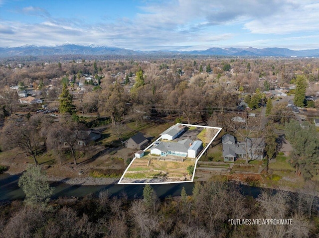 bird's eye view with a mountain view