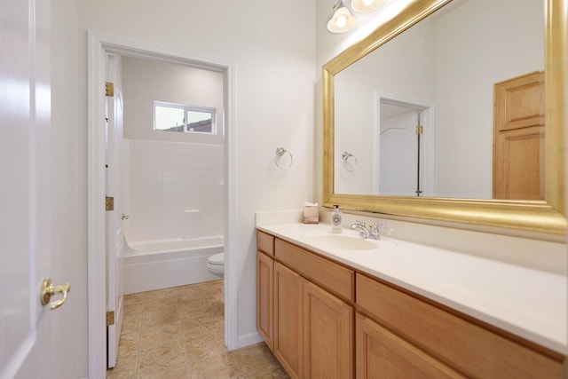 full bathroom with vanity, shower / bath combination, and toilet