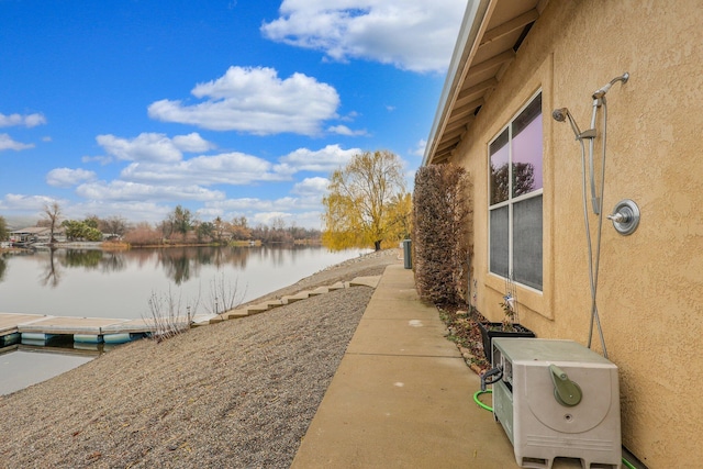 exterior space featuring a water view