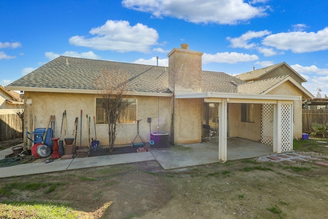 back of house with cooling unit and a patio