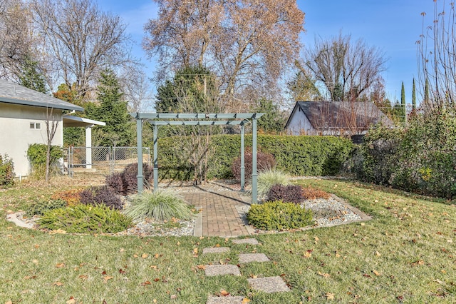 view of yard with a pergola